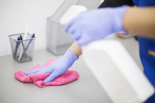 Professional commercial cleaning in a modern office lobby