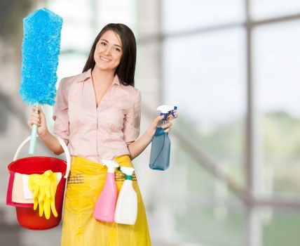 Cleaner wiping kitchen surfaces during one off cleaning