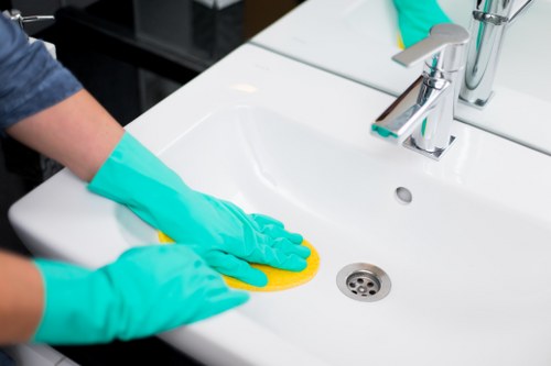 Professional cleaners preparing a renovated room